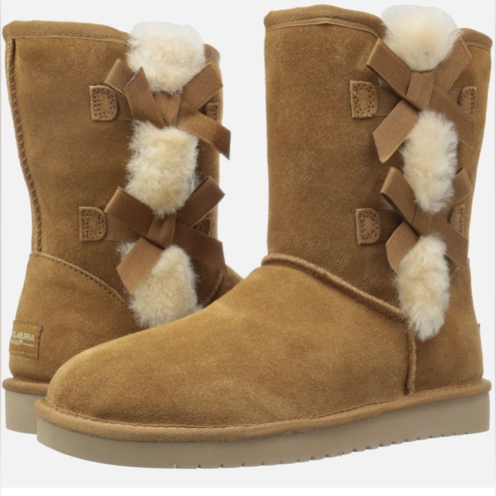 Women’s short Victoria Ugg boots size 11 w/ 2 bows